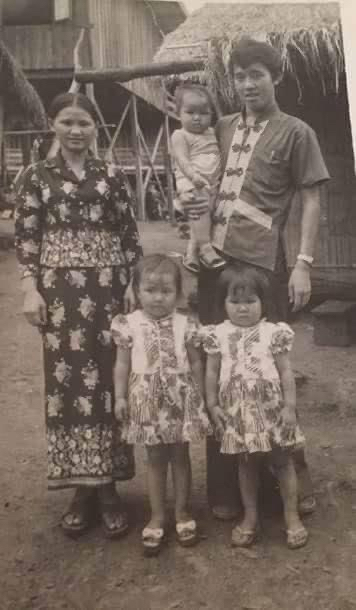 Black and white photo of Kaohly Her's family before arriving in the US.